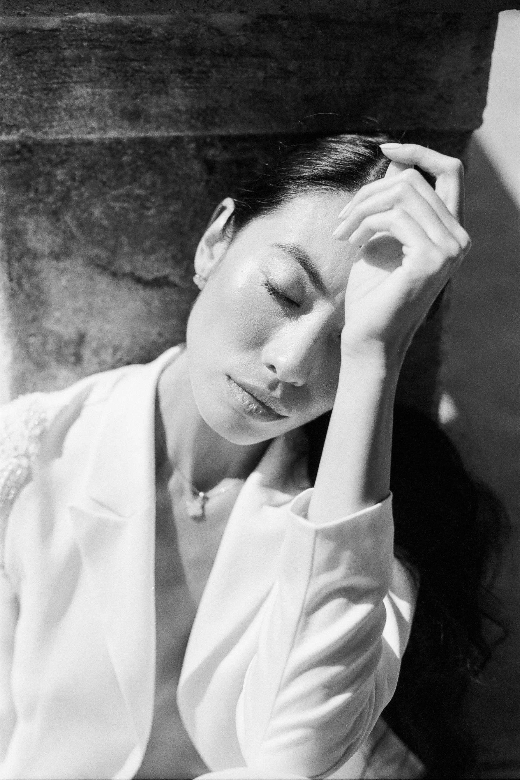 Grayscale Photo of Woman in White Collared Shirt